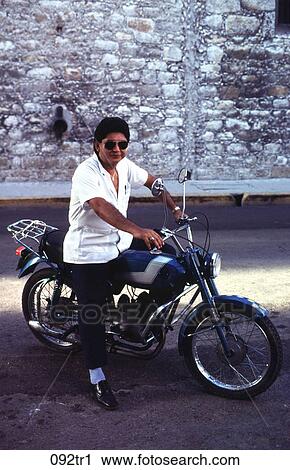 Man Sitting on a Blue Moped Mexico View Large Photo Image Stock Image - Man Sitting on a Blue Moped Mexico. Fotosearch