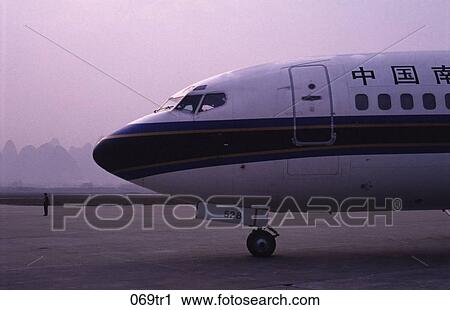 Plane Taxiing at Gulin Airport China View Large Photo Image Stock Image - Plane Taxiing at Gulin Airport China. Fotosearch