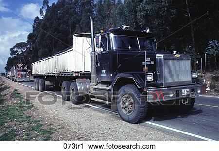 Stock Image - Trucks on a Highway Colombia. Fotosearch