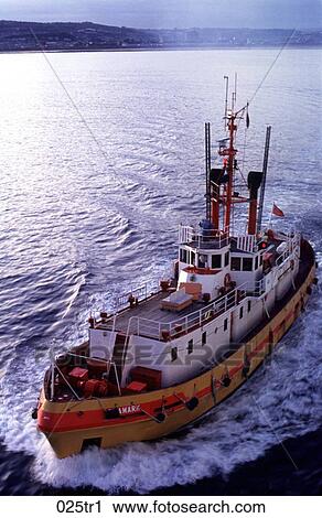 Stock Image - Tug Boat Turning in the Sea. Fotosearch