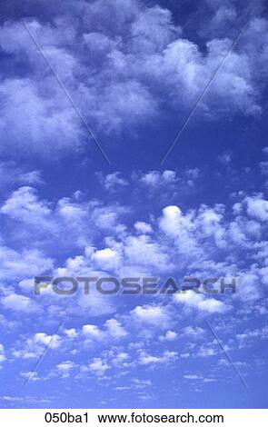 Stock Image - Clouds and Blue Sky. Fotosearch