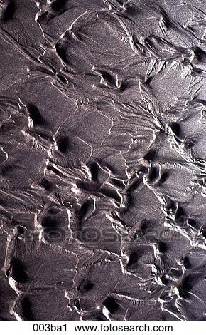 Stock Image - Water Pattern in Sand. Fotosearch