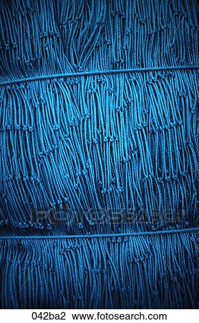 Stock Image - Turquoise Fisherman`s Net. Fotosearch