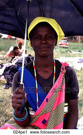 African Woman Holding an Umbrella South Africa View Large Photo Image Stock Image - African Woman Holding an Umbrella South Africa. Fotosearch