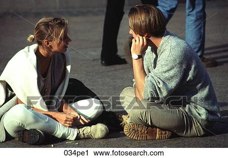 Couple of Teenagers Sitting on Floor Talking View Large Photo Image Stock Image - Couple of Teenagers Sitting on Floor Talking. Fotosearch