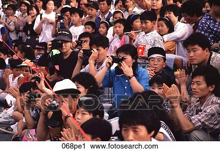 Crowd of Spectators Taking Photographs Korea View Large Photo Image Stock Image - Crowd of Spectators Taking Photographs Korea. Fotosearch