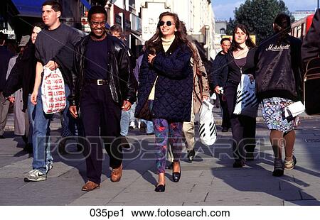 Group of Shoppers Walking in London View Large Photo Image Stock Image - Group of Shoppers Walking in London. Fotosearch