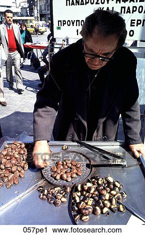 Man Roasting Chestnuts to Sell Athens Greece View Large Photo Image Stock Image - Man Roasting Chestnuts to Sell Athens Greece. Fotosearch