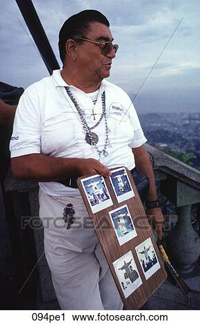 Man Selling Holiday Photographs Brazil View Large Photo Image Stock Image - Man Selling Holiday Photographs Brazil. Fotosearch
