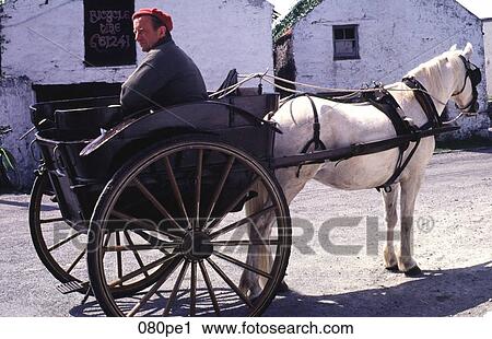 Stock Image - Man with Pony and Trap Ireland. Fotosearch