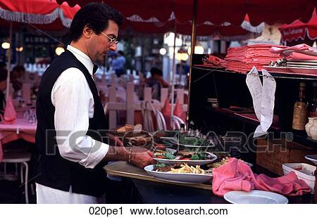 Parisian Waiter Serving Food France View Large Photo Image Stock Image - Parisian Waiter Serving Food France. Fotosearch