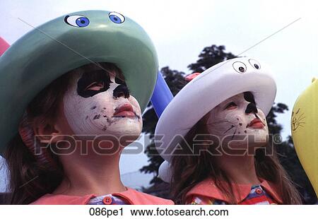 Twin Girls with Painted Faces Looking up View Large Photo Image Stock Image - Twin Girls with Painted Faces Looking up. Fotosearch