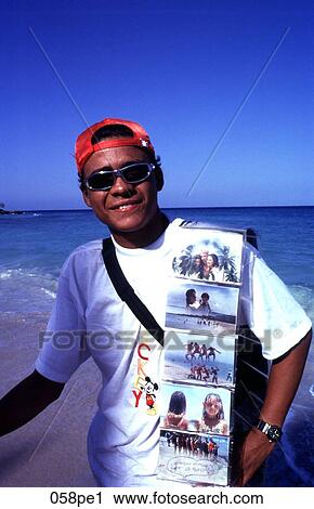 Young Man on a Colombian Beach Selling Postcards View Large Photo Image Stock Image - Young Man on a Colombian Beach Selling Postcards. Fotosearch