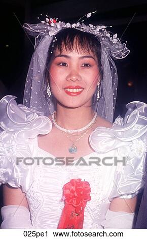 Young Woman Smiling Wearing a Wedding Dress China View Large Photo Image Stock Image - Young Woman Smiling Wearing a Wedding Dress China. Fotosearch