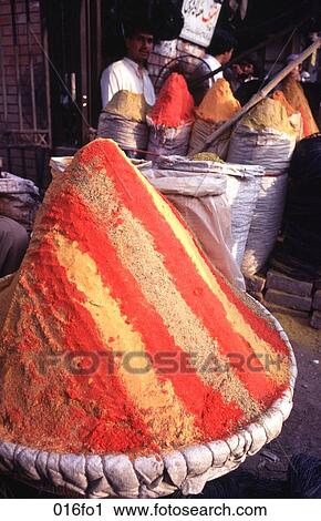 Stock Image - Heaped Baskets of Mixed Spices. Fotosearch
