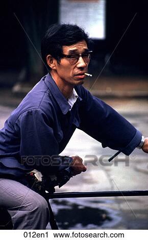 Man Smoking on Bicycle China View Large Photo Image Stock Image - Man Smoking on Bicycle China. Fotosearch