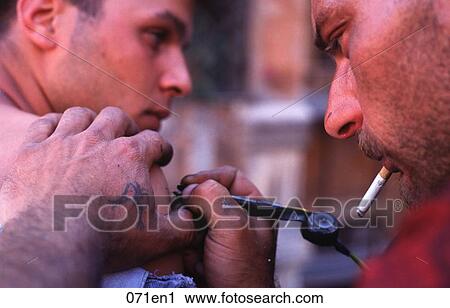 Tattooist and Client Italy View Large Photo Image Stock Image - Tattooist and Client Italy. Fotosearch