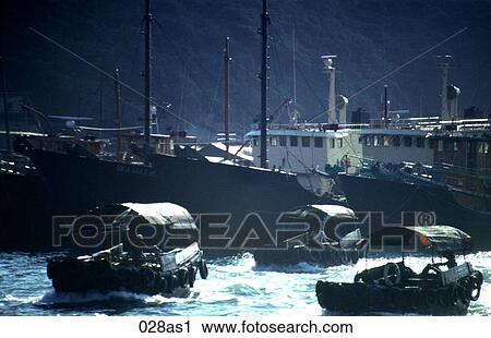 Stock Image - Boats in the Harbour Aberdeen Hong Kong. Fotosearch