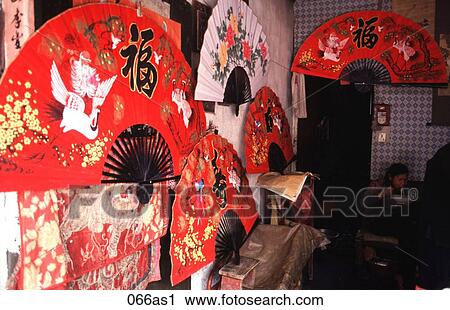 Stock Image - Fans in a Shop Gulin China. Fotosearch