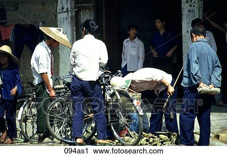 Local Market Traders with Bicycles View Large Photo Image Stock Image - Local Market Traders with Bicycles. Fotosearch