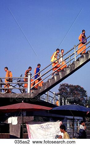 Buddhist Monks Climbing Steps Thailand Asia View Large Photo Image Stock Image - Buddhist Monks Climbing Steps Thailand Asia. Fotosearch