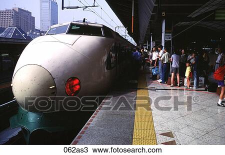 Stock Image - Bullet Train in Station Tokyo Japan Asia. Fotosearch