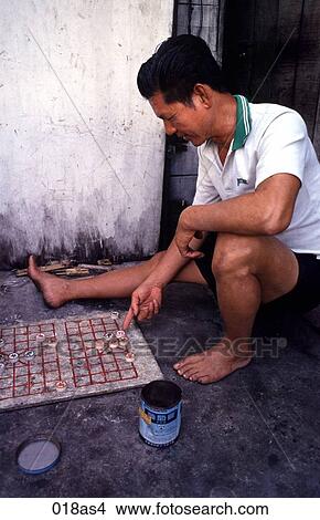 Man Playing Board Game Kuala Lumpur Malaysia Asia View Large Photo Image Picture - Man Playing Board Game Kuala Lumpur Malaysia Asia. Fotosearch