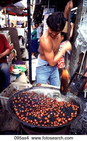 Man Roasting Chestnuts Manila The Philippines Asia View Large Photo Image Picture - Man Roasting Chestnuts Manila The Philippines Asia. Fotosearch
