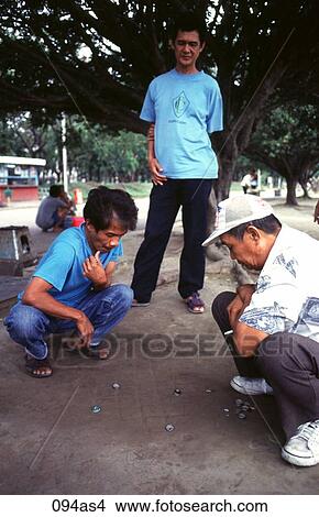 Men Playing Counter Game Manila The Philippines Asia View Large Photo Image Picture - Men Playing Counter Game Manila The Philippines Asia. Fotosearch