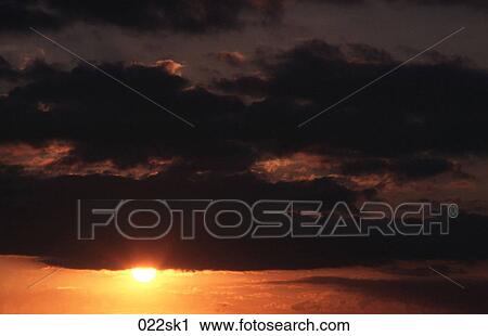 Golden Sun behind Black Clouds View Large Photo Image Stock Image - Golden Sun behind Black Clouds. Fotosearch