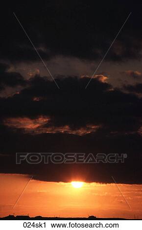 Golden Sun behind Black Clouds View Large Photo Image Stock Image - Golden Sun behind Black Clouds. Fotosearch