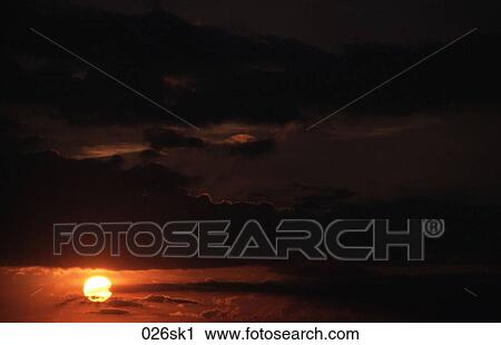 Golden Sun with Black Clouds View Large Photo Image Stock Image - Golden Sun with Black Clouds. Fotosearch