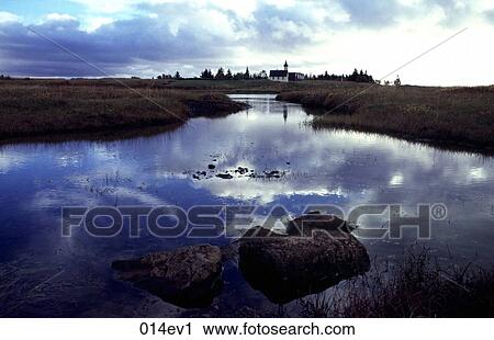 Stock Image - Reflections in River Pingvellir National Park Iceland. Fotosearch