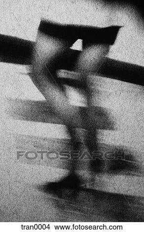 Picture - black&white, blur, blurred, blurs, corridor, legs, mini-skirt. Fotosearch