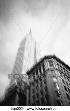 black&white, blur, blurred, city, Empire State Building, looking up, New York City View Large Photo Image Picture - black&white, blur, blurred, city, Empire State Building, looking up, New York City. Fotosearch