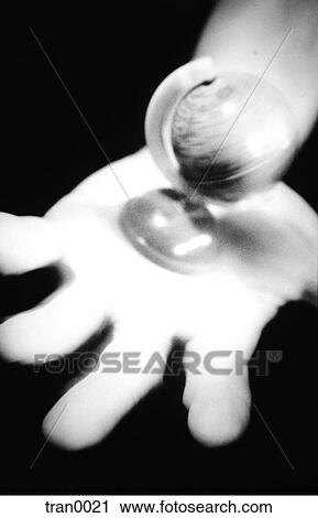 black&white, blurred hand holding globe, give, giving, global, globe, hand View Large Photo Image Stock Image - black&white, blurred hand holding globe, give, giving, global, globe, hand. Fotosearch