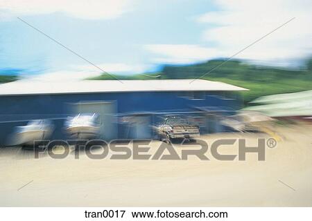 Stock Photo - boats, blur, boating, boat, blurred, building, americana. Fotosearch