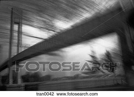 Stock Image - black&white, blur, blurred, bridge, crossing, NYC, pedestrian bridge. Fotosearch