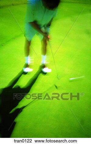 Stock Image - cup, aim, blurry, blurred, aiming, golf club, activities. Fotosearch