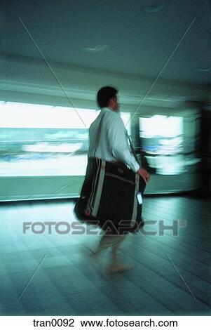 flying, blur, daylight, corridor, businessman, hurrying, airport View Large Photo Image Stock Image - flying, blur, daylight, corridor, businessman, hurrying, airport. Fotosearch