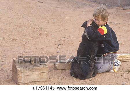 Stock Photography - A boy with his dog. Fotosearch