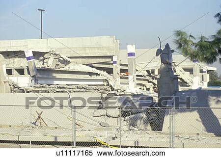 Stock Photography - A collapsed parking garage at a shopping center. Fotosearch