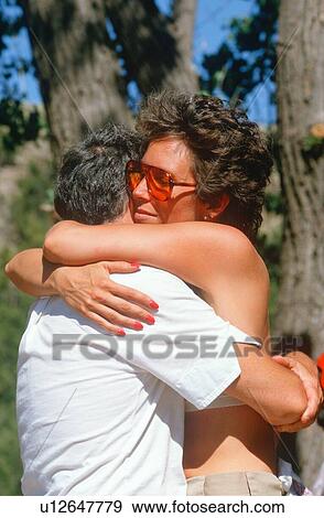 Stock Photo - A couple embracing. Fotosearch