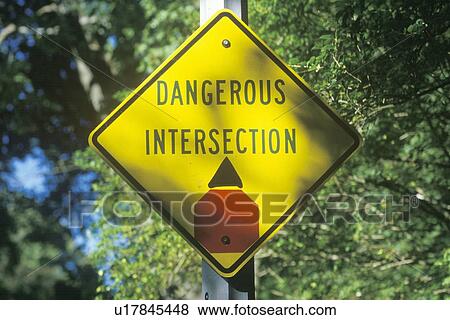 A dangerous intersection road sign View Large Photo Image Stock Photo - A dangerous intersection road sign. Fotosearch