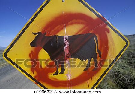 Stock Image - A defaced roadside sign. Fotosearch