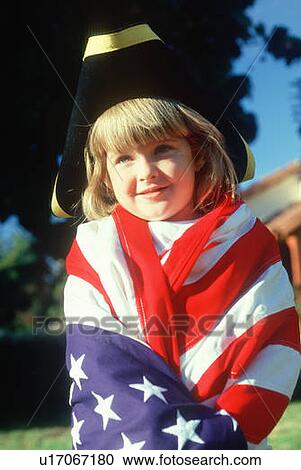 A little girl draped in an American flag View Large Photo Image Stock Image - A little girl draped in an American flag. Fotosearch