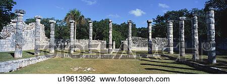 Stock Image - A panoramic view of columns at Chichen Itza. Fotosearch