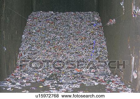 A pile of compacted aluminum cans in a cement compacter View Large Photo Image Stock Photo - A pile of compacted aluminum cans in a cement compacter. Fotosearch
