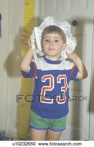 A pre-school boy wearing a bonnet View Large Photo Image Stock Image - A pre-school boy wearing a bonnet. Fotosearch