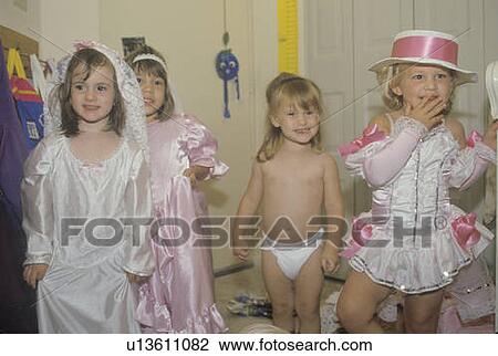 Stock Image - A preschool class playing dressup. Fotosearch